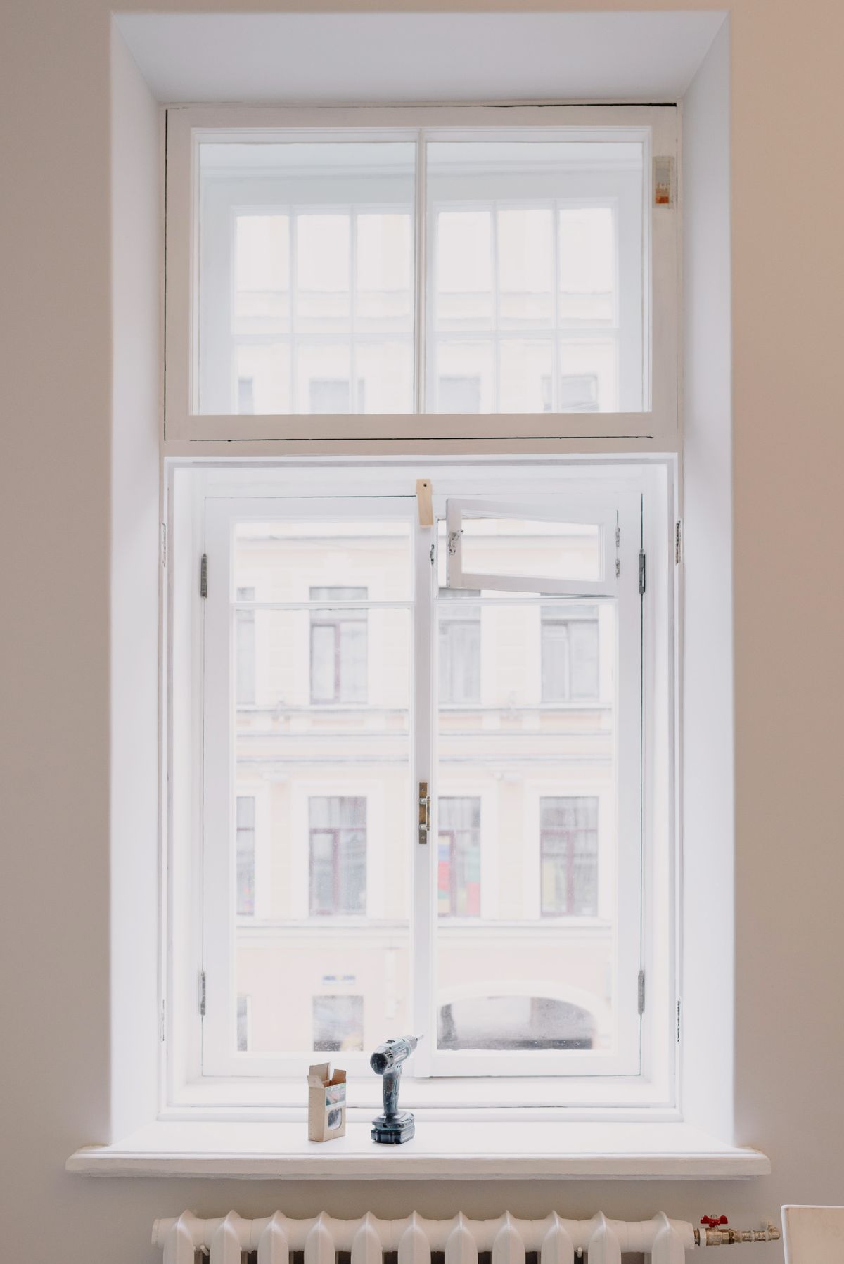 New white window installed in a bright room