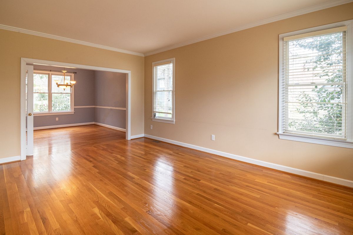Freshly installed hardwood flooring in a sunlit room